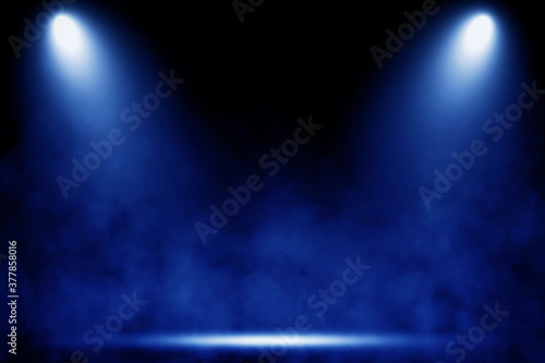 Empty space of Studio dark room with blue lighting effect and smoke in black background.