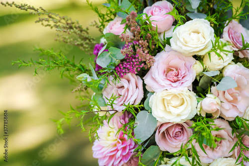Fresh flower decoration of a wedding arch - pink and white fresh flowers. Fresh roses flower arrangement © miladrumeva