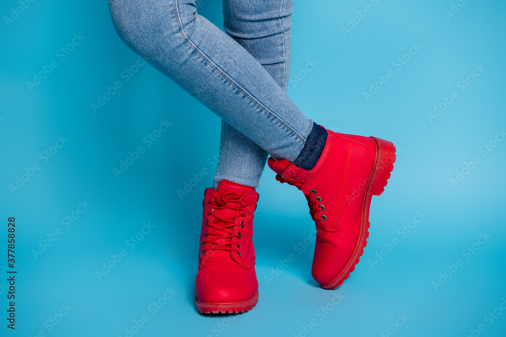 Cropped photo of slim lady legs standing alone boot tiptoe youngster girl  pose wear trendy expensive red shoes boots sneakers denim jeans isolated  blue color background 스톡 사진 | Adobe Stock