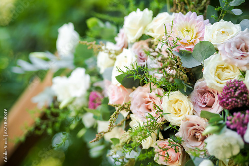 Fresh flower decoration of a wedding arch - pink and white fresh flowers. Fresh roses flower arrangement