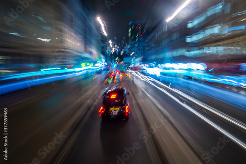 Abstract of light trails from traffic and buildings in the city of London © seanliew