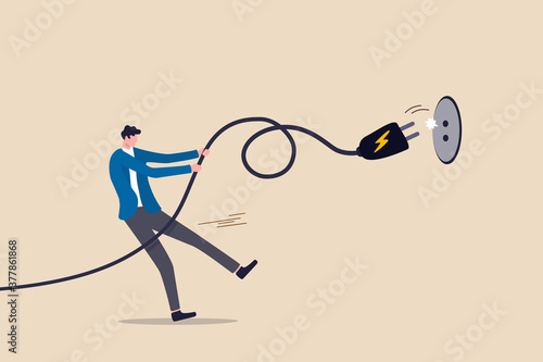 Electricity saving, ecology awareness or reduce electric cost and expense concept, man pulling electric cord to unplug to save money or for ecology power.
