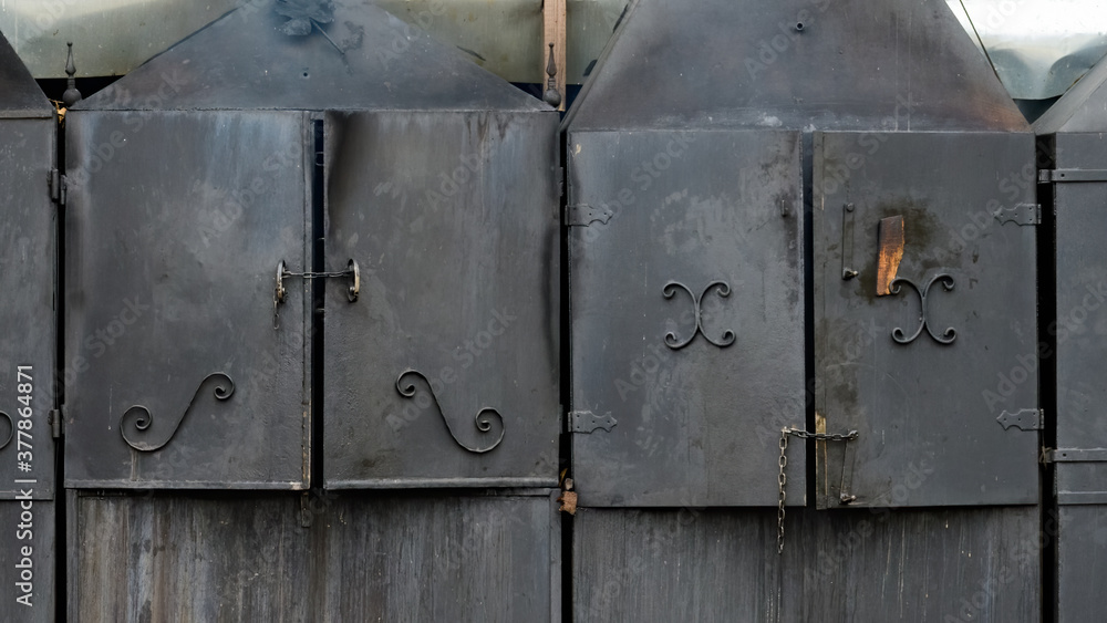 Naklejka premium Aged, smokehouse smoking furnaces made from dark steel.