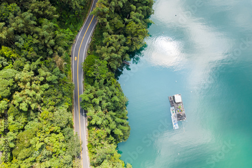 road in forest with a boat at Sun Moon Lake