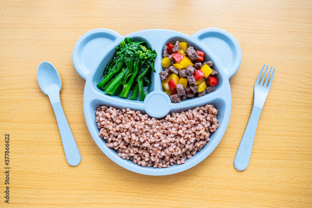 A plate of nutritional meals for children on the table A plate of nutritional meals for children on the table