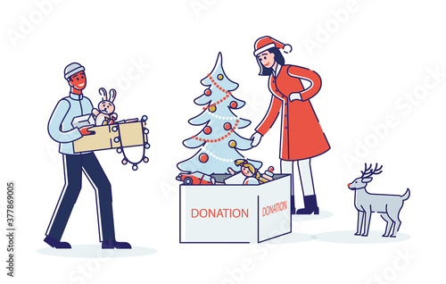 Couple of volunteers giving toys for christmas donation and charity for poor kids gifts