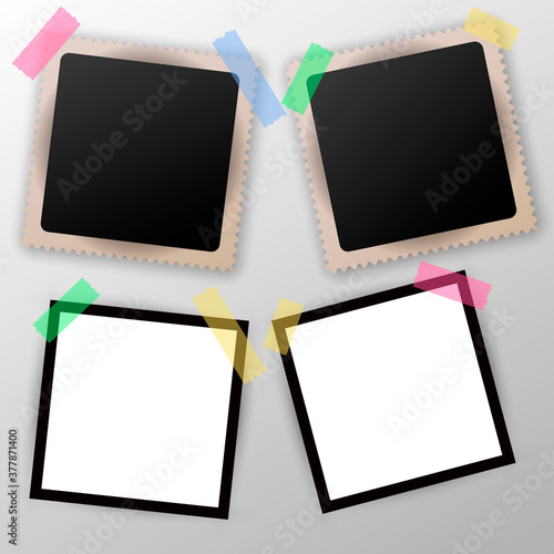 Old blank photo frame set with tape