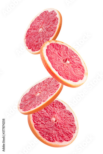 falling grapefruit slices isolated on a white background