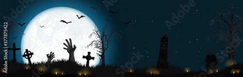 Halloween zombie hands in front of full moon