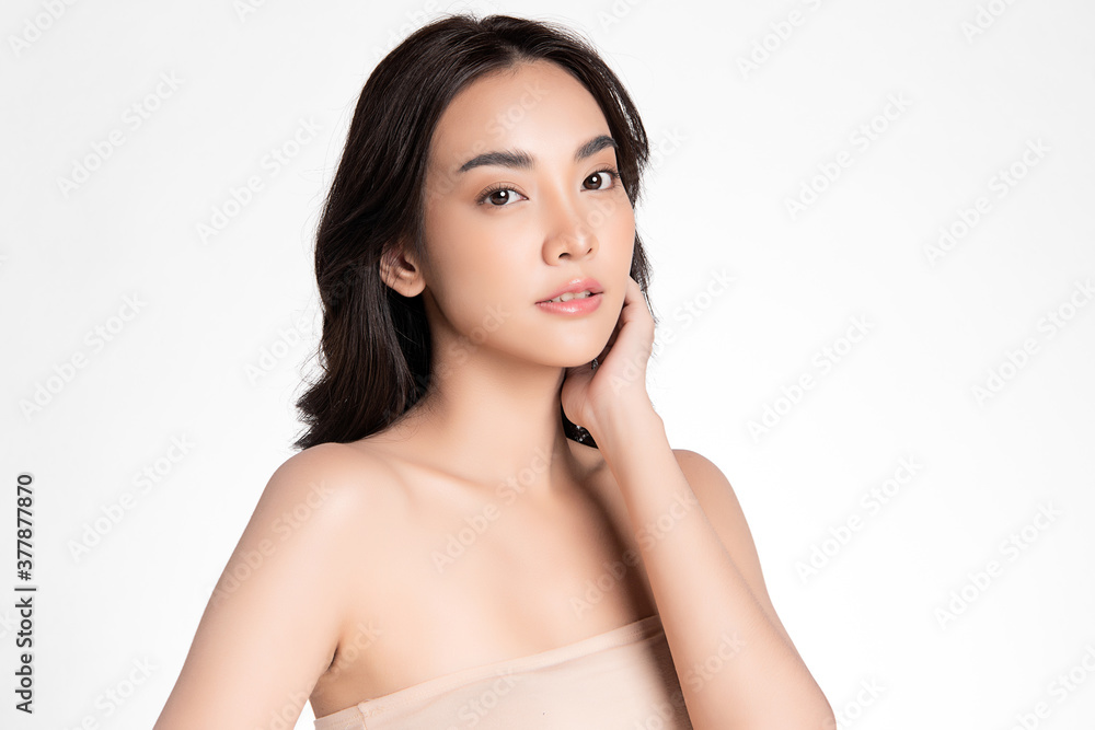 Beautiful young asian woman with clean fresh skin on white background, Face care, Facial treatment, Cosmetology, beauty and spa, Asian women portrait Beautiful young asian woman with clean fresh skin on white background, Face care, Facial treatment, Cosmetology, beauty and spa, Asian women portrait