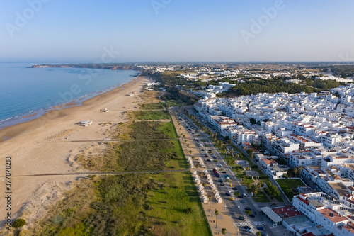 Paseo Maritimo of Conil de la Frontera seen from above aerial view in Cadiz, Andalusia