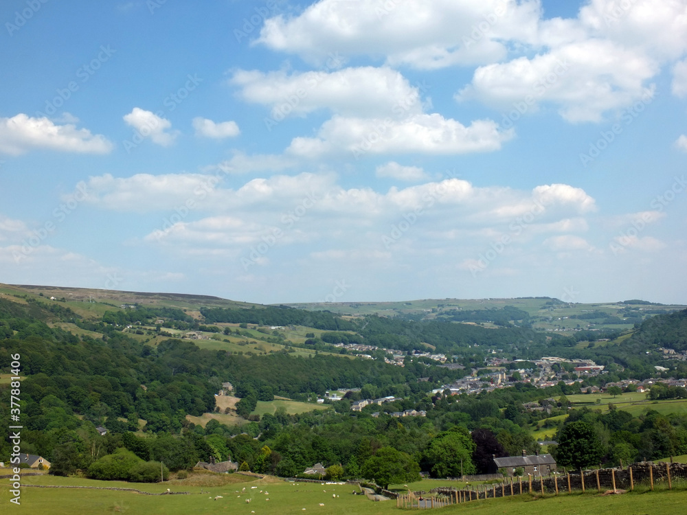 scenic view of the town of mytholmroyd surrounded by woods and fields in the calder valley west yorkshire
