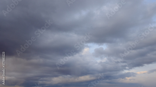 Gray cloudy sky as background. Dramatic sky.