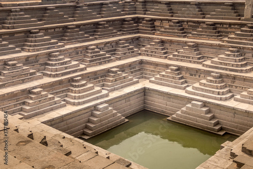 Photography pushkarni area at hampi karnataka india with pond surroundings