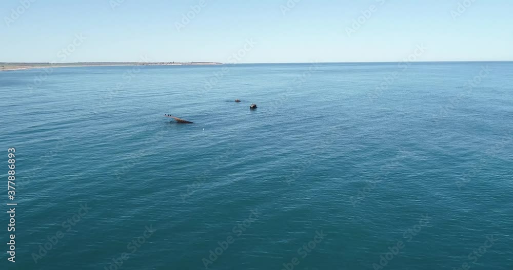 Shipwreck. Abandoned rusty vessel in water Shipwreck. Abandoned rusty vessel in water