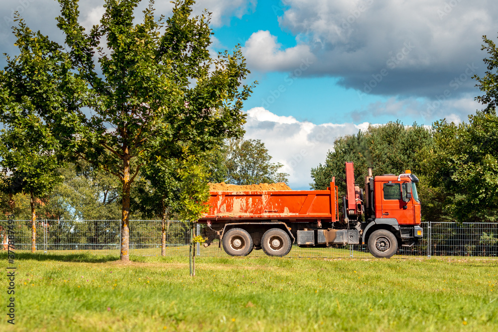Heavy dump truck transporting sand Heavy dump truck transporting sand