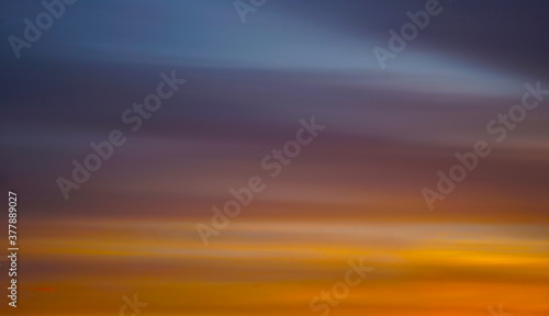  Abstract orange yellow blue background. The sky at sunset. Colorful banner. Golden sunset background with copy space for your design. 