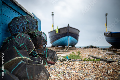 Landscape shot of lobster pots and fishing boats on the Lancing/Worthing coast, West Sussex