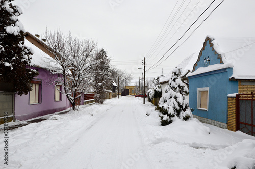 snowy winter in rural village Backi Petrovac, Vojvodina © Jana