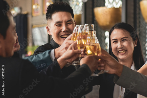 Asian business people drinking celebrate happy business success