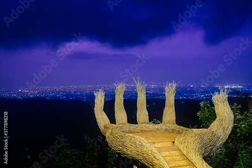 Landscape of the famous Hand Palm spot at Hutan Pinus Pengger Yogyakarta, Indonesia. photo