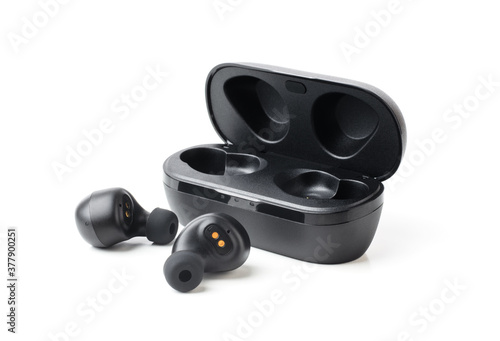 Bild auf Leinwand Wireless black bluetooth earphones