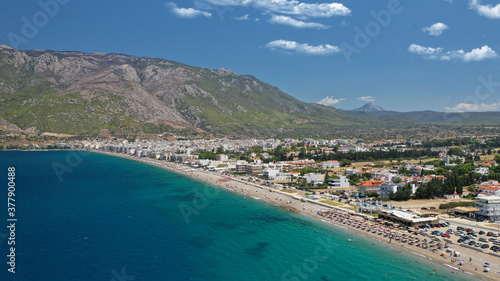 Aerial drone photo of famous seaside area, organised beach and bay of Loutraki town, Corinthian bay, Greece © aerial-drone