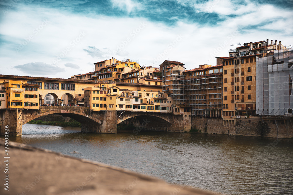 Ponte Vecchio - medieval stone segmental arch bridge in Florence, Italy.