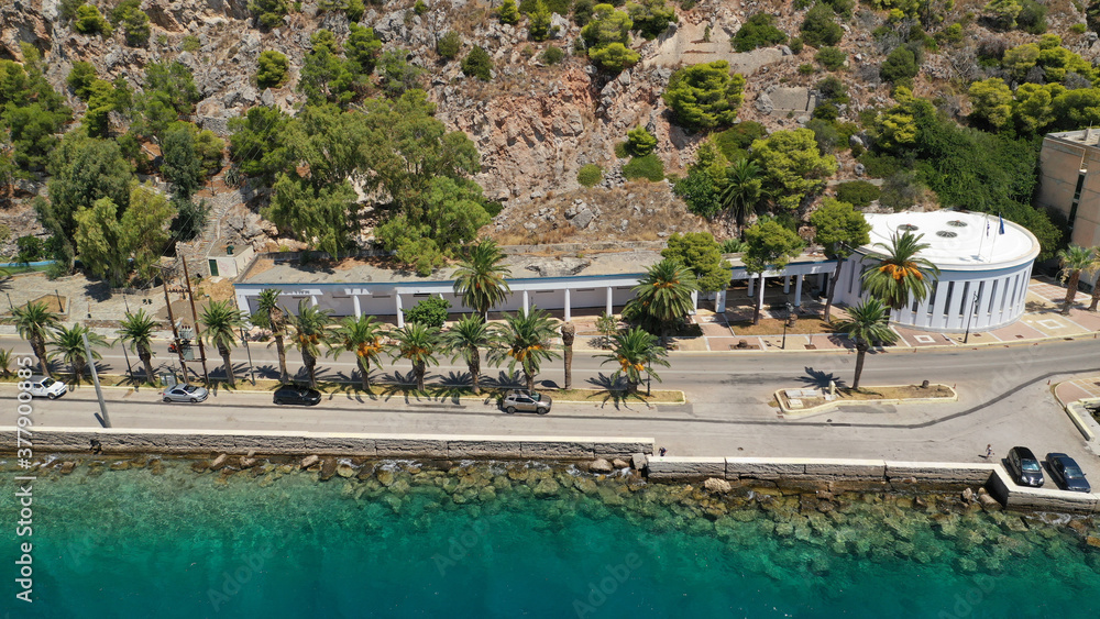 Aerial drone photo of famous seaside area, organised beach and bay of Loutraki town, Corinthian bay, Greece