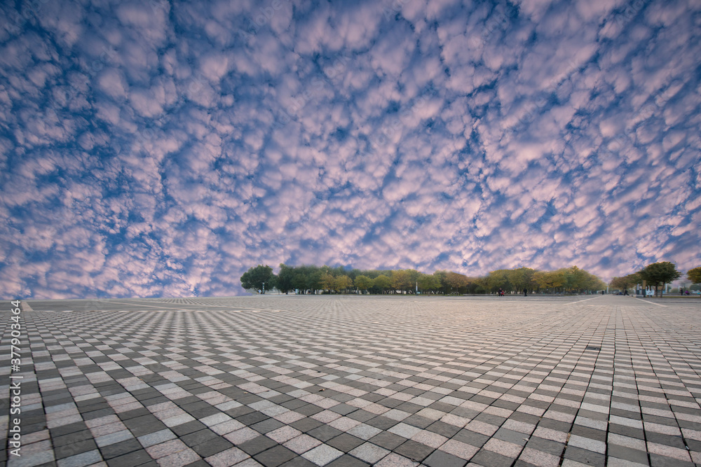Fototapeta premium City Square under the background of blue sky and white clouds