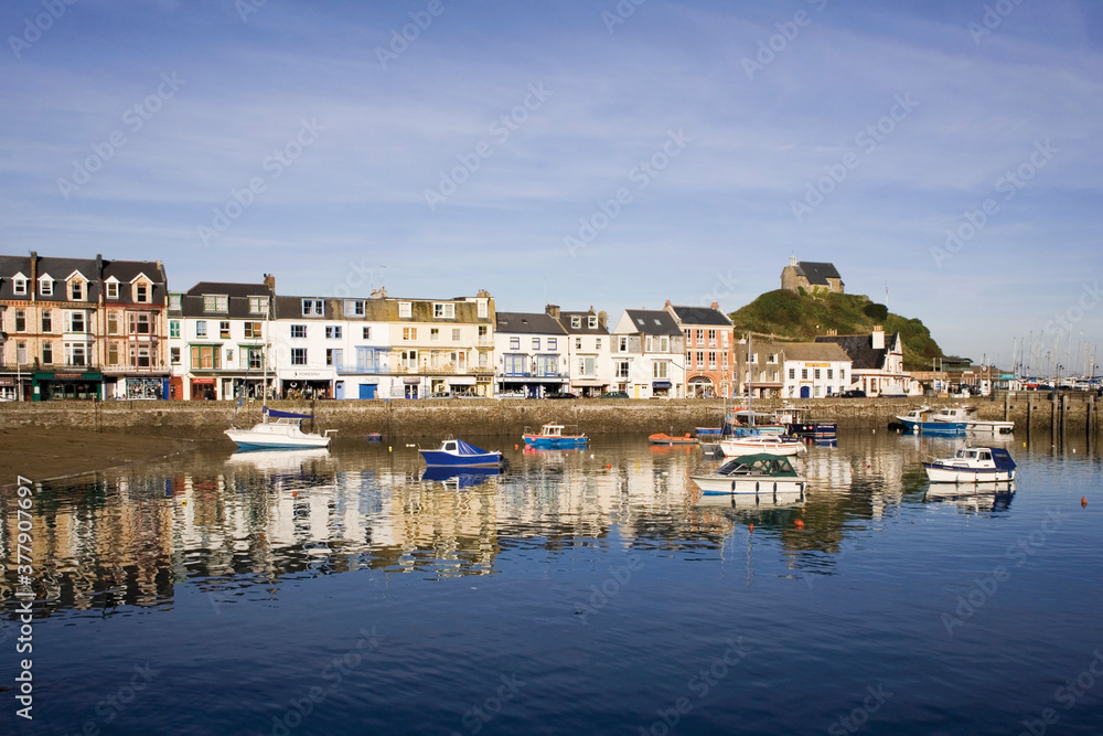 Ilfracombe is a seaside resort and civil parish on the North Devon coast, England, with a small harbour surrounded by cliffs.