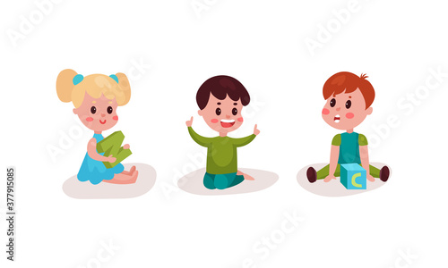 Little Kids Sitting on Floor and Playing with Alphabet Blocks Vector Illustration Set
