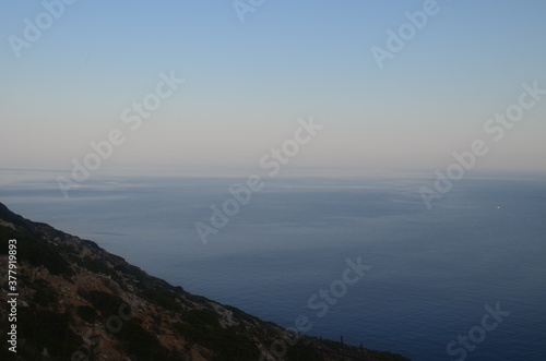 when the sea meets the sky at sunset in Greece