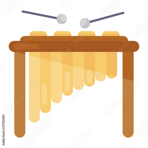 
Percussion instrument consisting of a series of graduated wooden bars, xylophone 
