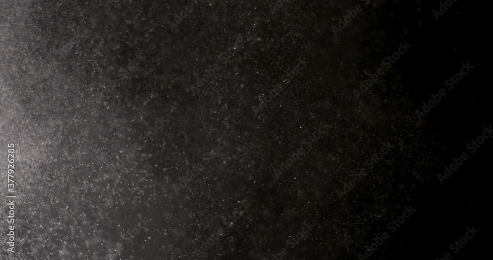 White dust powder isolated on black background White dust powder isolated on black background