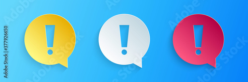 Paper cut Exclamation mark in circle icon isolated on blue background. Hazard warning symbol. Paper art style. Vector.