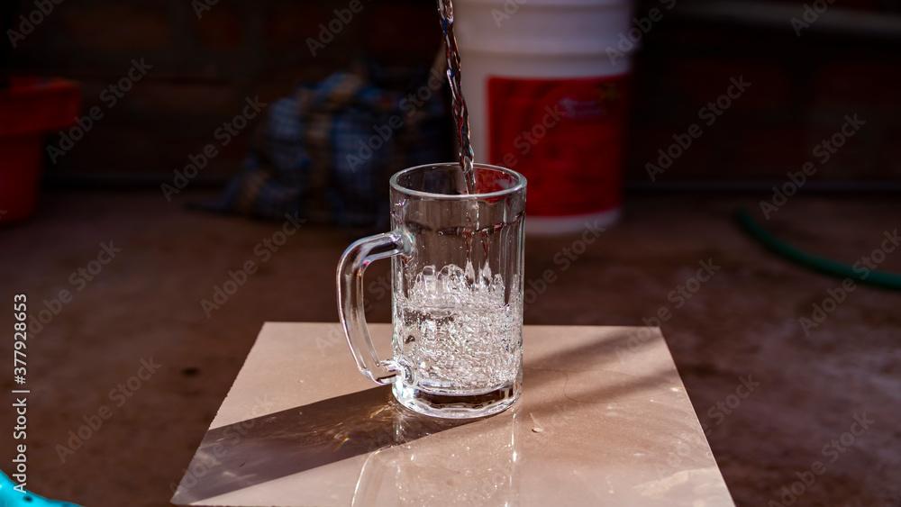 serving water in a crystal glass