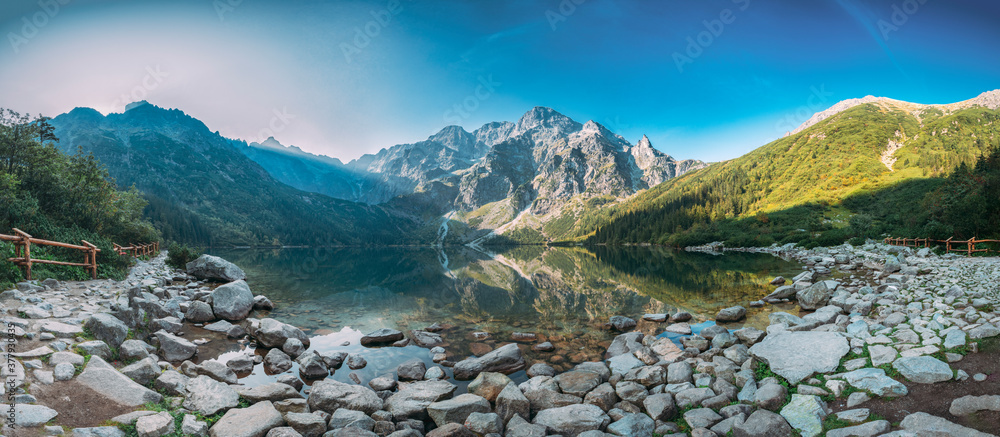 Fototapeta Tatra National Park, Poland. Panorama Famous Mountains Lake Morskie Oko Or Sea Eye Lake In Summer Morning. Five Lakes Valley. Beautiful Scenic Viev