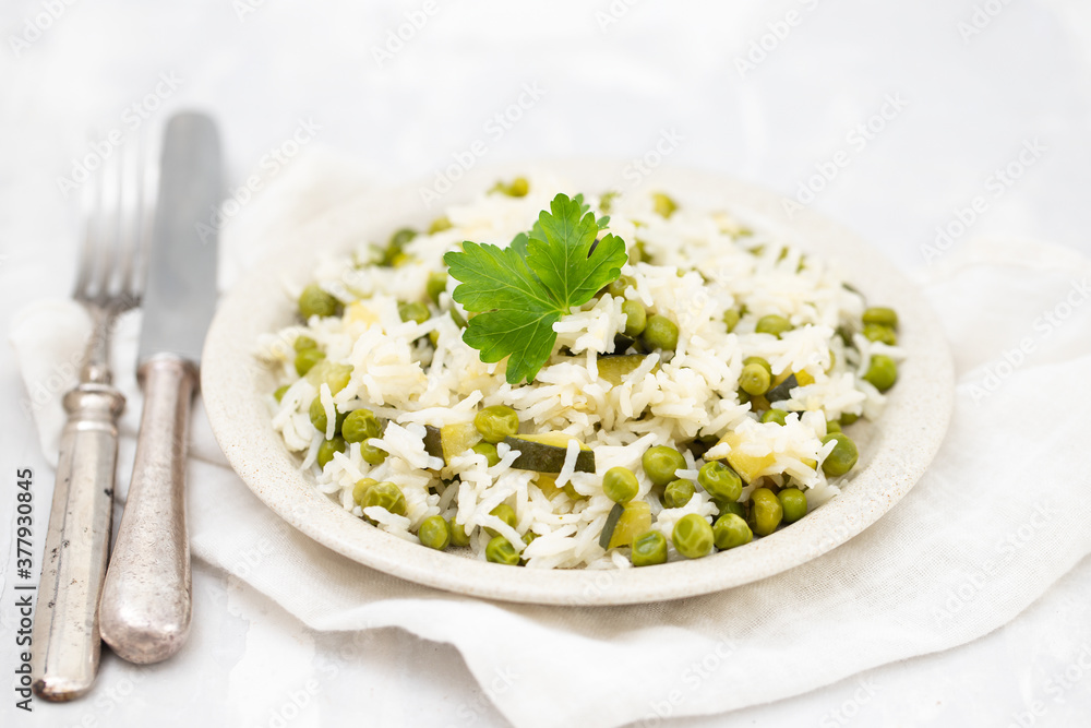 boiled rice with green vegetables in the dish boiled rice with green vegetables in the dish