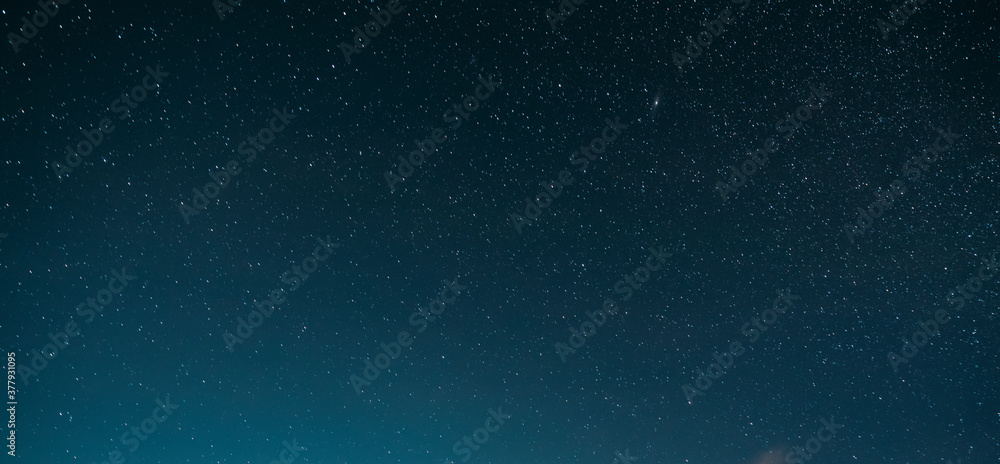 Night Starry Sky With Glowing Stars. Night Starry Sky Blue Background Night Starry Sky With Glowing Stars. Night Starry Sky Blue Background