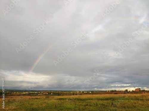 rainbow over the field after a thunderstorm © Anna