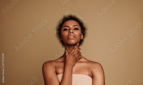 African american woman on brown background