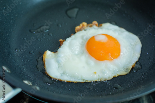 Fried eggs Thai Style in a frying pan