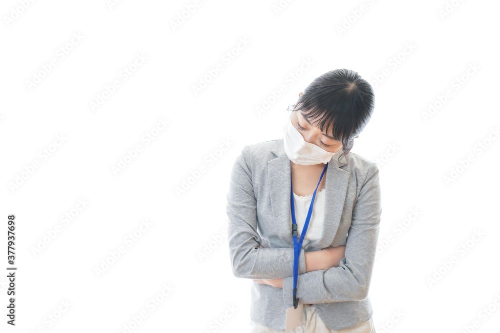 腹痛に苦しむ若いビジネスパーソン