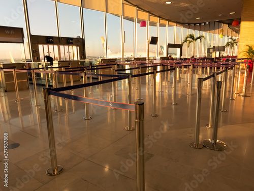 Empty departure hall of Paris airport during Covid-19 situation,this airport is the most traffic airport in France. With sunset warm light. Disaster economic world crisis
