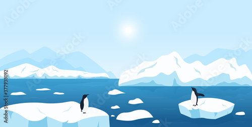 Beautiful Arctic or Antarctic landscape. North scenery with large icebergs floating in ocean and penguins. Snow mountains hills, scenic northern icy nature background