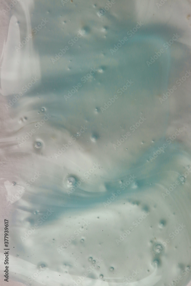 Fototapeta premium Blue wash gel smooth textured background