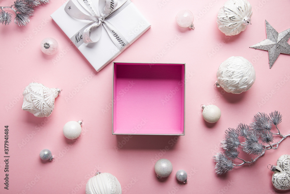 Merry Christmas and Happy Holidays greeting card, frame, banner. New Year. Noel. Christmas white silver ornaments and empty gift box on pink background top view. Winter xmas holiday theme. Flat lay
Merry Christmas and Happy Holidays greeting card, frame, banner. New Year. Noel. Christmas white silver ornaments and empty gift box on pink background top view. Winter xmas holiday theme. Flat lay