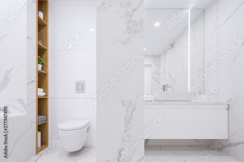 Luxury bathroom in marble tiles
