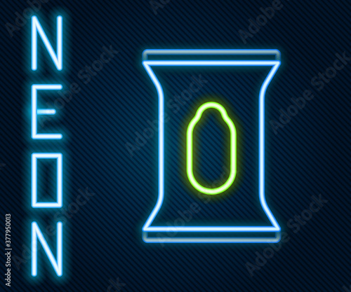 Glowing neon line Wet wipe pack icon isolated on black background. Colorful outline concept. Vector.